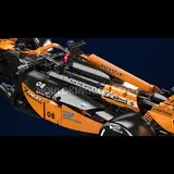Top-down view of the MCL Racing Car chassis, displaying sponsor decals and structural details.